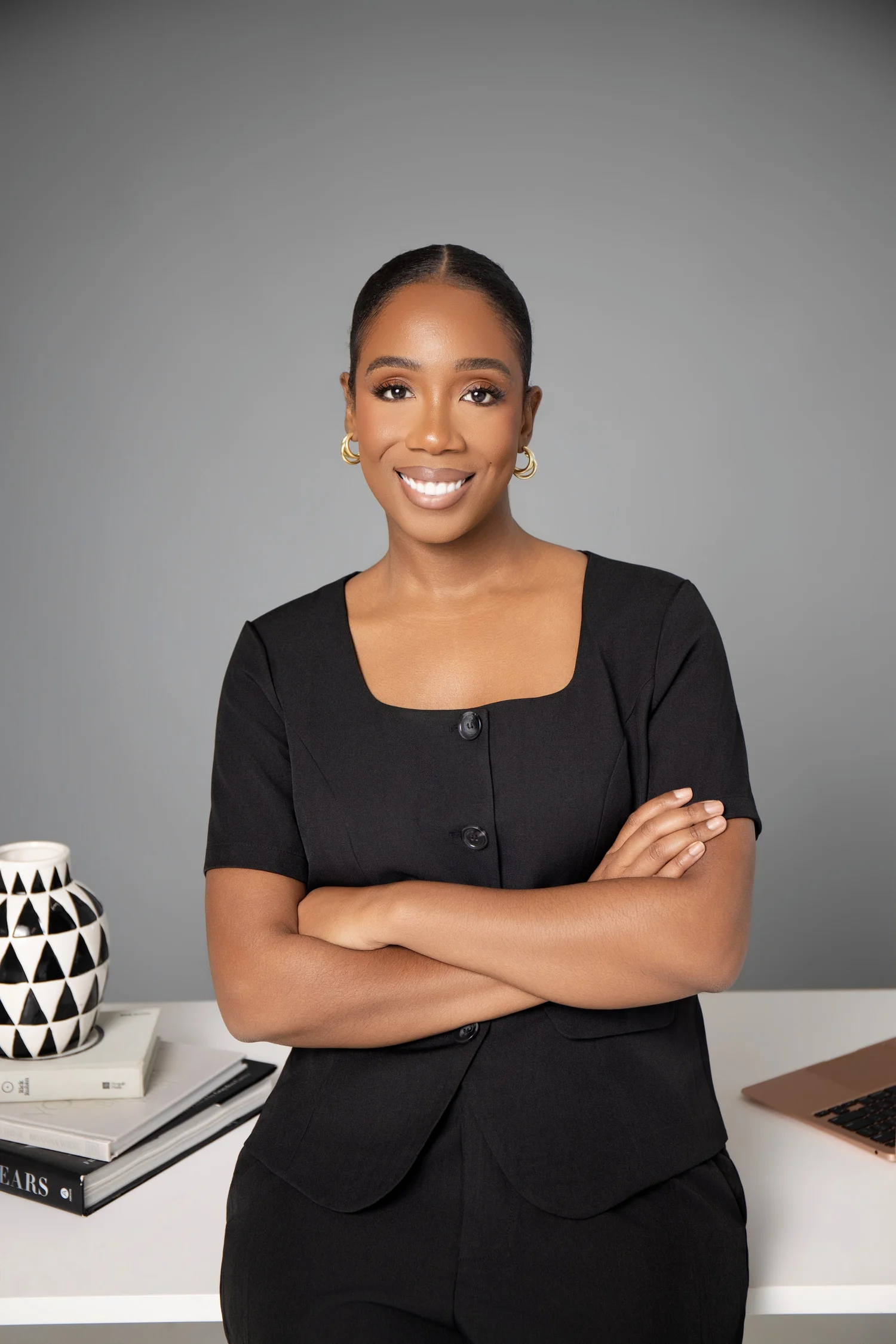 Cierra Gross smiling at her desk
